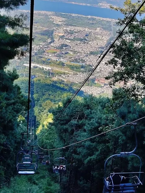 The Cangshan chairlift rising above the Dali plain
