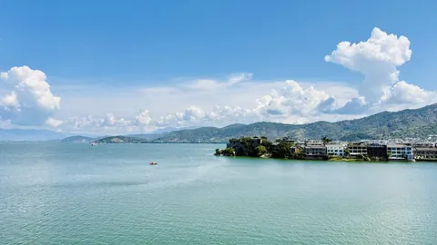 Erhai's calm water and distant shoreline from Nanzhao Fengqing Island