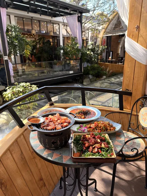 A terrace table set with local dishes in Dali Old Town