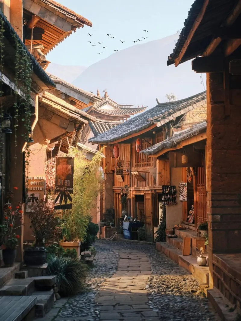 An old cobbled lane in Shaxi in warm light