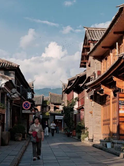 A quiet street of old shopfronts in Weishan